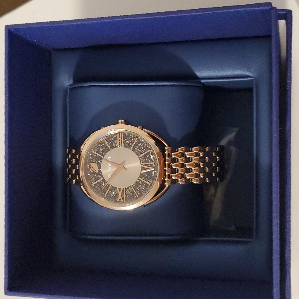 Swarovski  crytalline watch Swiss  Made. Champagne gold tone.